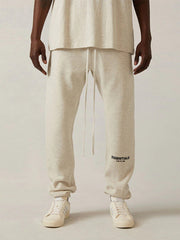 FEAR OF GOD ESSENTIALS - Tapered Logo-Flocked Cotton-Blend Jersey Sweatpants