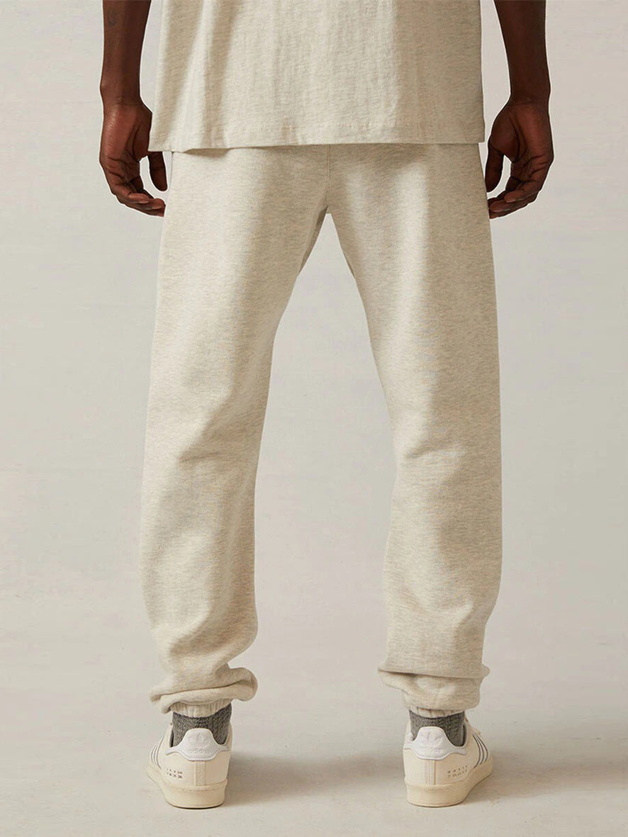 FEAR OF GOD ESSENTIALS - Tapered Logo-Flocked Cotton-Blend Jersey Sweatpants